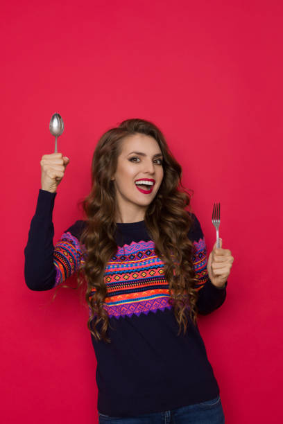 istock Excited And Happy Young Woman Is Holding Spoon And Fork 1270227158