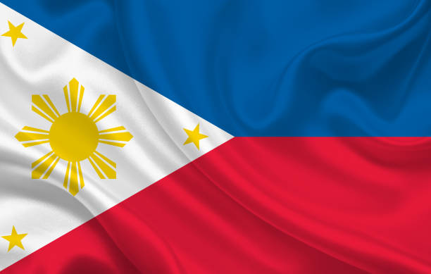 istock Philippines country flag on wavy silk fabric background panorama 1270227314