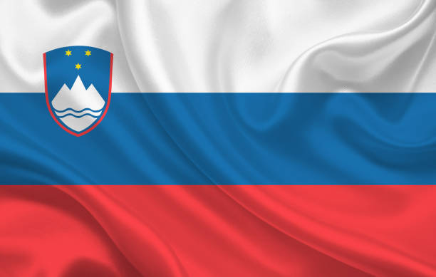 istock Slovenian country flag on wavy silk fabric background panorama 1270228306