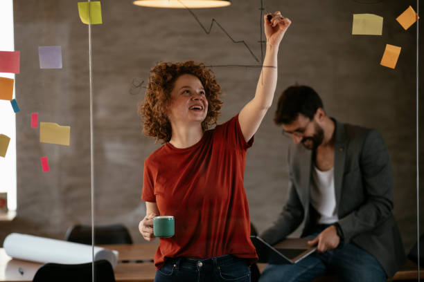 istock Beautiful businesswoman working on projects 1270233137