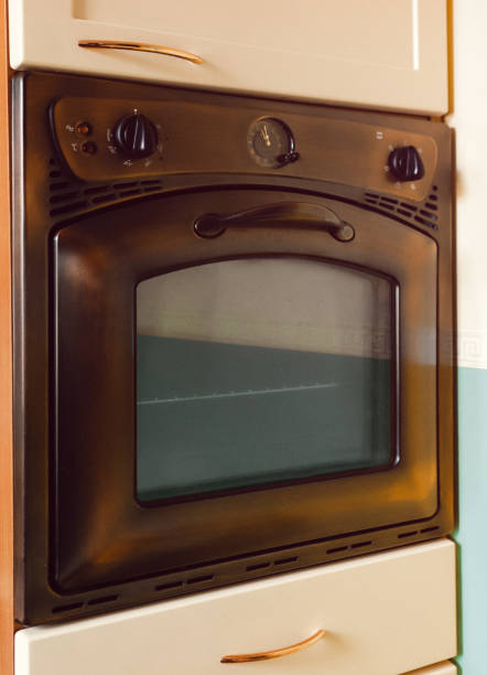 istock Orange Copper Oven and Teal Blue wall 1270233139