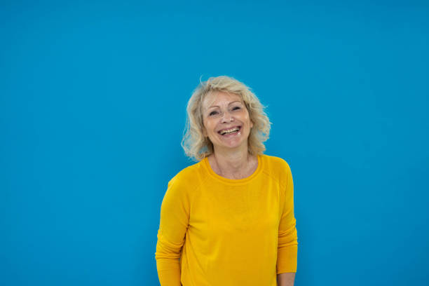 istock Senior Woman Looking At Camera And Smiling 1270233237