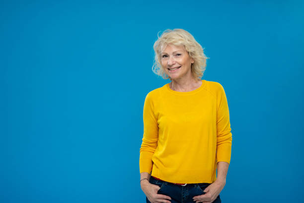 istock Senior Woman Looking At Camera And Smiling 1270233243