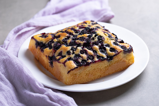 Homemade blueberry cake, decorated with fresh berries