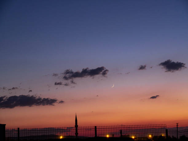 New moon on the sky and mosque