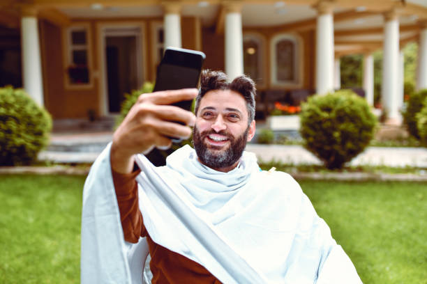 Smiling Male Taking Funny Selfie Mid Haircut