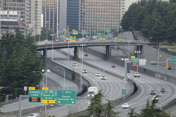 istock Multi-Lane Freeway Winding Through Densely Populated City Before Morning Rush 1270240195