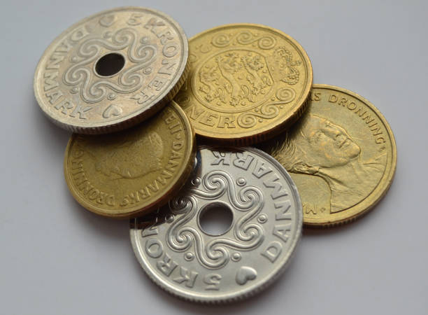 куча датских монет - danish currency стоковые фото и изображения