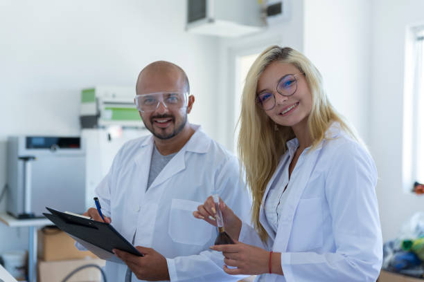 istock University Chemistry Laboratory Research Students Working in Class Together 1270242911