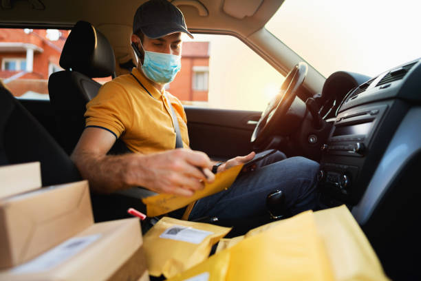istock Courier making deliveries in his van 1270244972