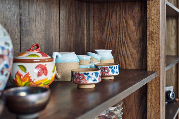 istock Wood cupboard shelving plates tea cup and jugs 1270250690
