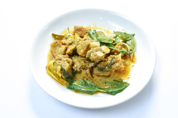 istock spicy fried pork bone with slice finger root in curry sauce 1270253951