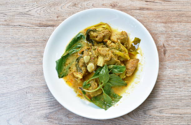istock spicy fried pork bone with slice finger root in curry sauce 1270254820
