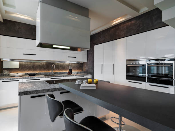 istock interiors shots of a modern kitchen with kitchen island and wood table 1270257178