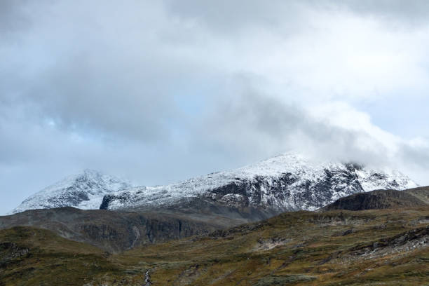 istock Mountain snow and rocks high peaks Norway view 1270257377
