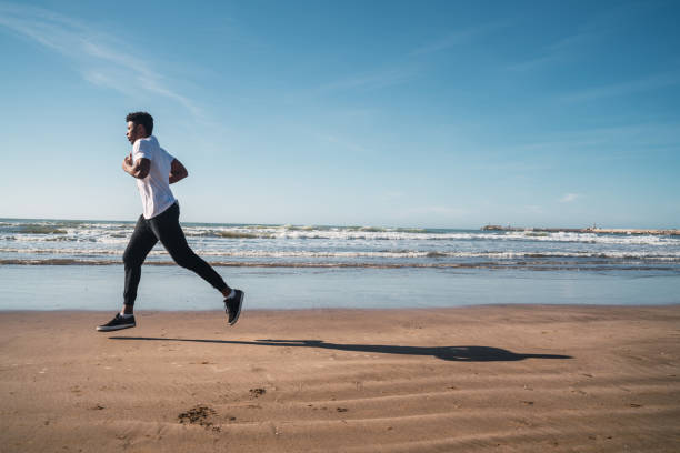 istock Portrait of an athletic man running. 1270258508
