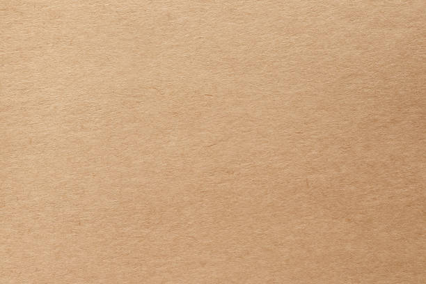 brown kraft paper texture background, pattern of handmade cardboard sheet in old and vintage style. - cardboard texture imagens e fotografias de stock