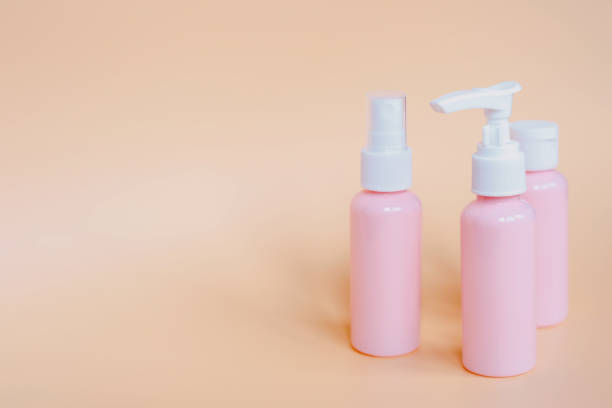 istock Pink plastic bottles containers for cosmetics, soap, shower gel, cream 1270260787