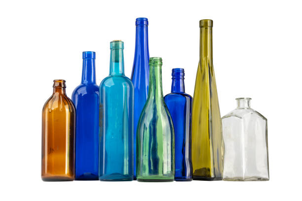 istock A row of empty glass wine bottles, different colors on a white background 1270260934
