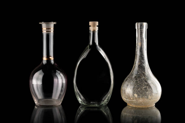 istock Beautifully illuminated decanters on a black background 1270261534