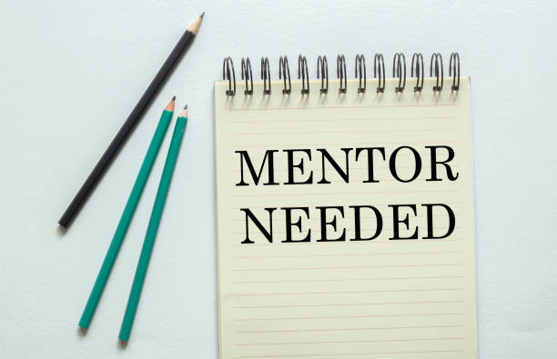 two green one black pencil with text Mentor Needed in the notebook on the white background two green one black pencil with text Mentor Needed in the notebook on the white background escribir stock pictures, royalty-free photos & images