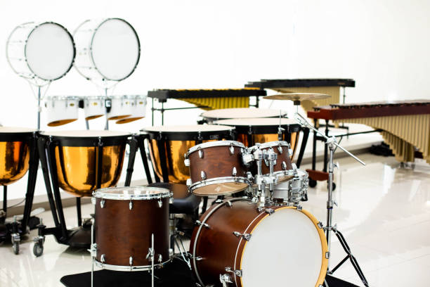 istock Selective focus to drum set with blurry marching band instrument in musical showroom 1270261649