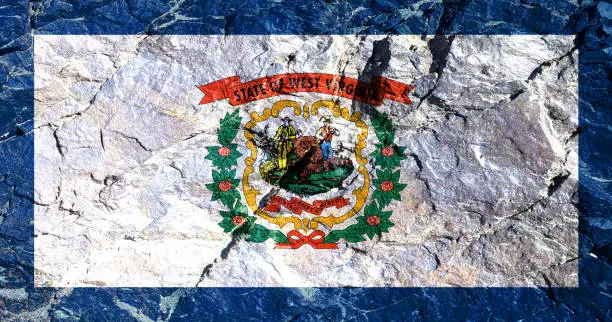 USA national flag painted on mountain wall in West Virginia against a white background with a coiled rhododendron coat of arms depicting a farmer and a miner. Two rifles ahead, and a red Phrygian cap