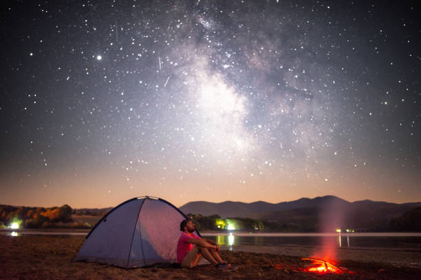 istock Lonely Camper under Milky Way in the mountain 1270263342