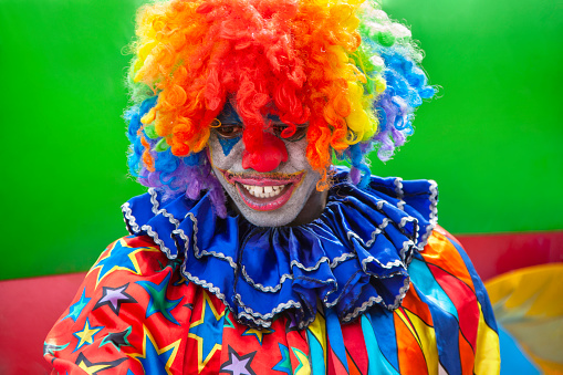 African clown in a costume at a kids party