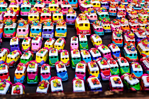 Small souvenir cars for sale on the market kiosk, Chichicastenango, Guatemala