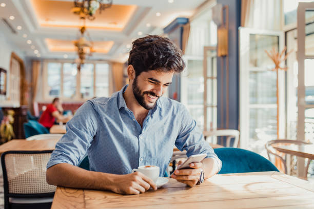 istock A young man sitting in a coffee shop 1270266224