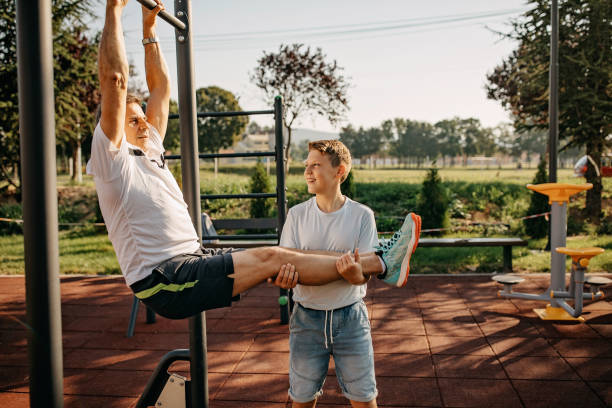 istock Senior man and grandson working out together 1270267496