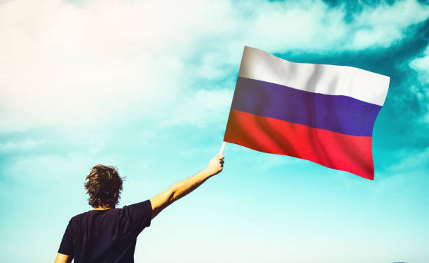 istock Patriotic man waving the Russian Flag 1270268819