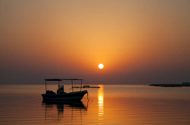 istock Boat in the morning hours  at Asker beach,  Bahrain 1270268980
