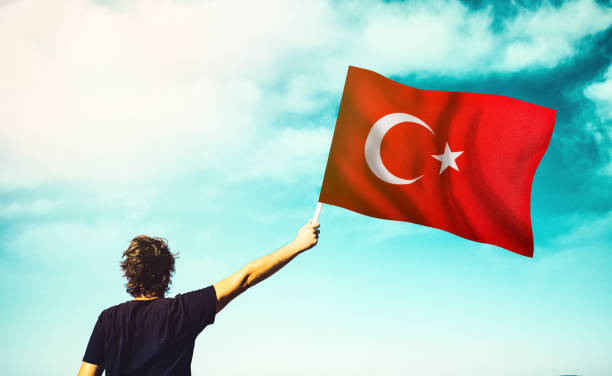 istock Patriotic man waving the Turkish Flag 1270268988