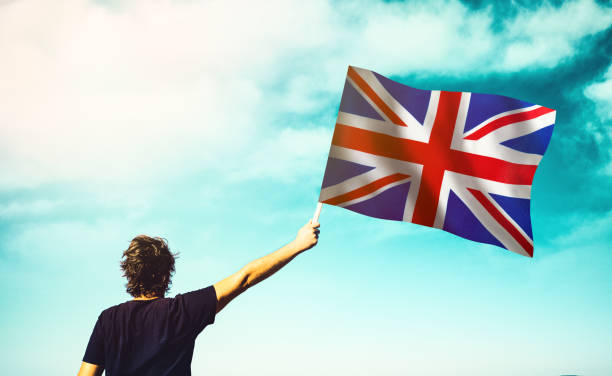 istock Patriotic man waving the British Flag 1270269274