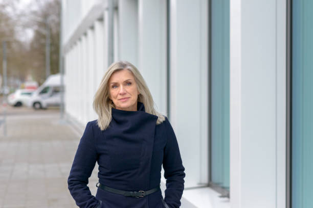 istock Attractive blond woman in a stylish blue coat 1270270519