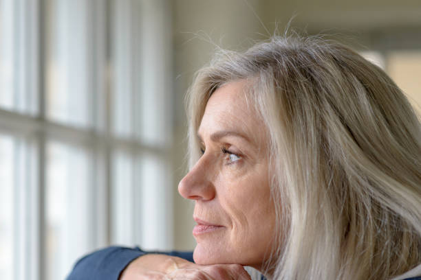istock Pretty thoughtful woman with serious expression 1270271461