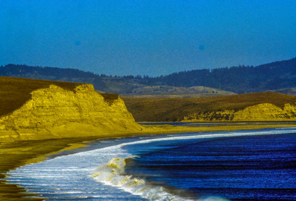California coastline beach sand surf Pacific bluffs sky