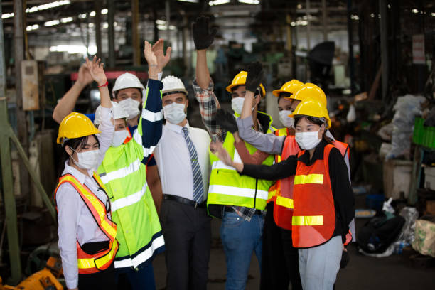 istock Closeup on Industrial Engineers hands as a team unity with Factory Worker. They Work at the Heavy Industry Manufacturing Facility. 1270276284