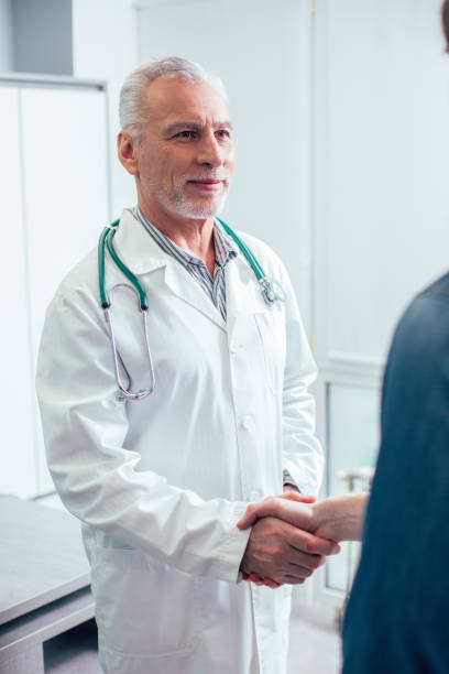 istock Confident doctor always happy to help people at work 1270277773