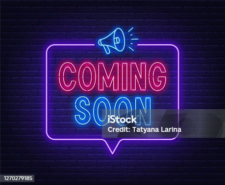 istock Coming soon neon sign in speech bubble frame with megaphone. 1270279185