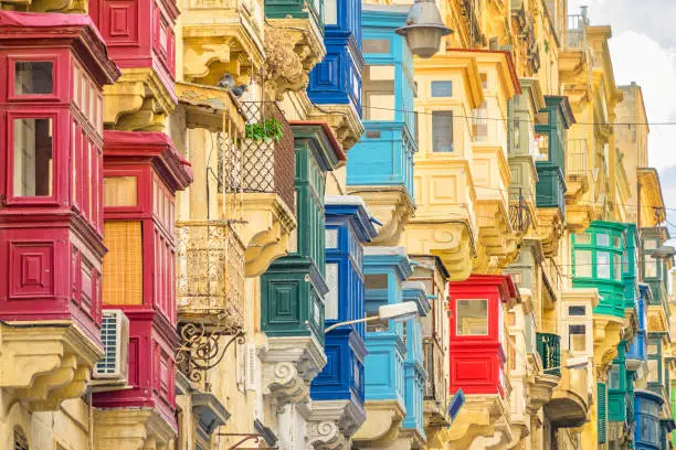 Stock photograph of traditional Maltese Balconies in old town Valletta Malta.