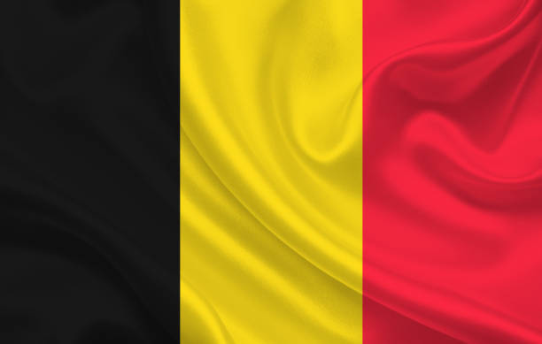 belgia flaga kraju na faliste jedwabne tkaniny tło panorama - belgium map flag three dimensional shape stock illustrations
