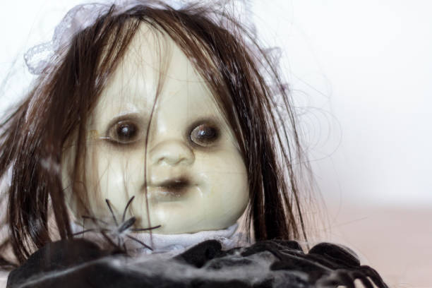 istock Creepy doll face with spiders. Halloween concept 1270282658