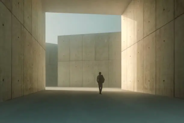 Businessman walking in concrete corridor. This is entirely 3D generated image.