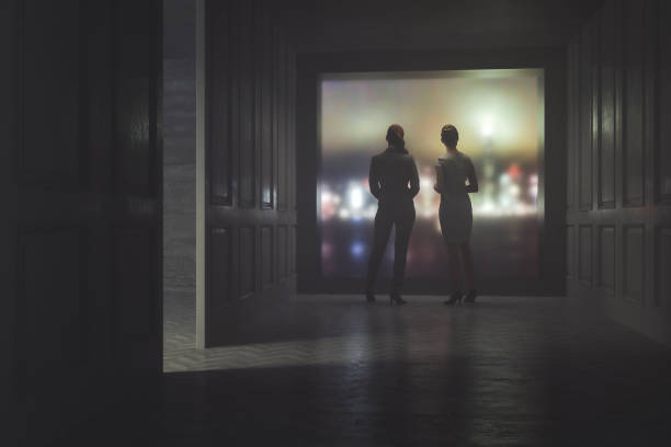istock Businesswomen talking in the dark 1270284042
