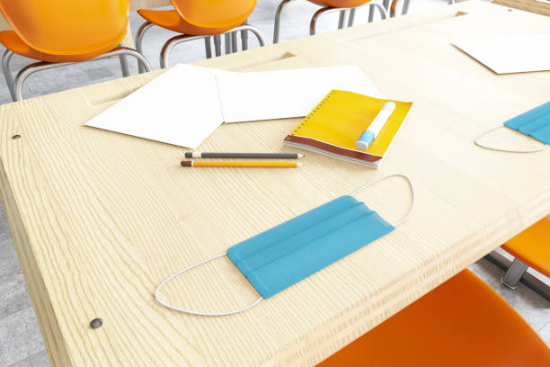 istock Back to School Concept with Classroom and Surgical Face Mask 1270291155