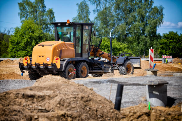 istock Yellow grader in place of future highway 1270292263