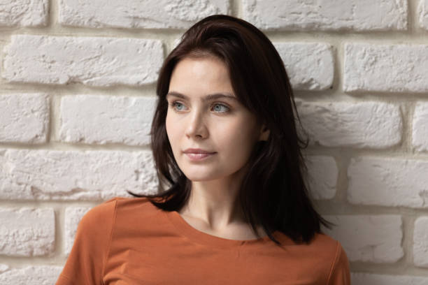 istock Pensive girl look in distance thinking or dreaming 1270295103